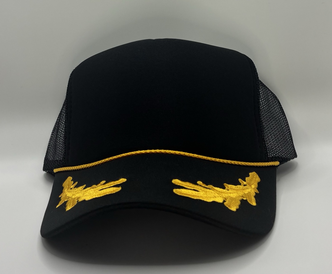 Gold laurel trucker hat