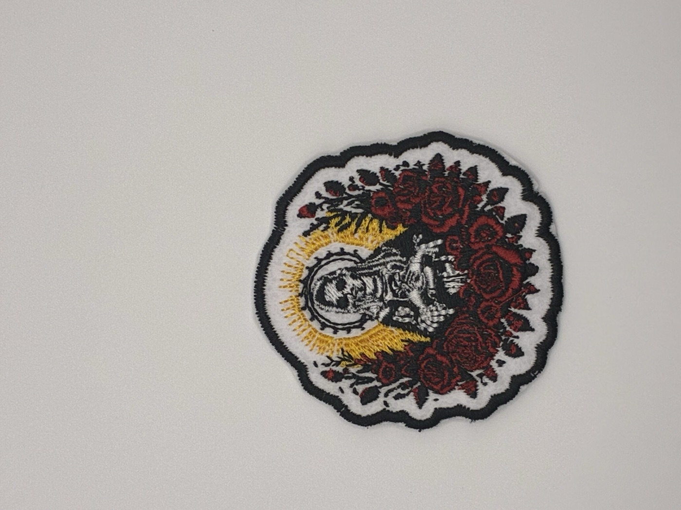 Skull and roses embroidered patch